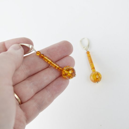 Medium long amber earrings round beads